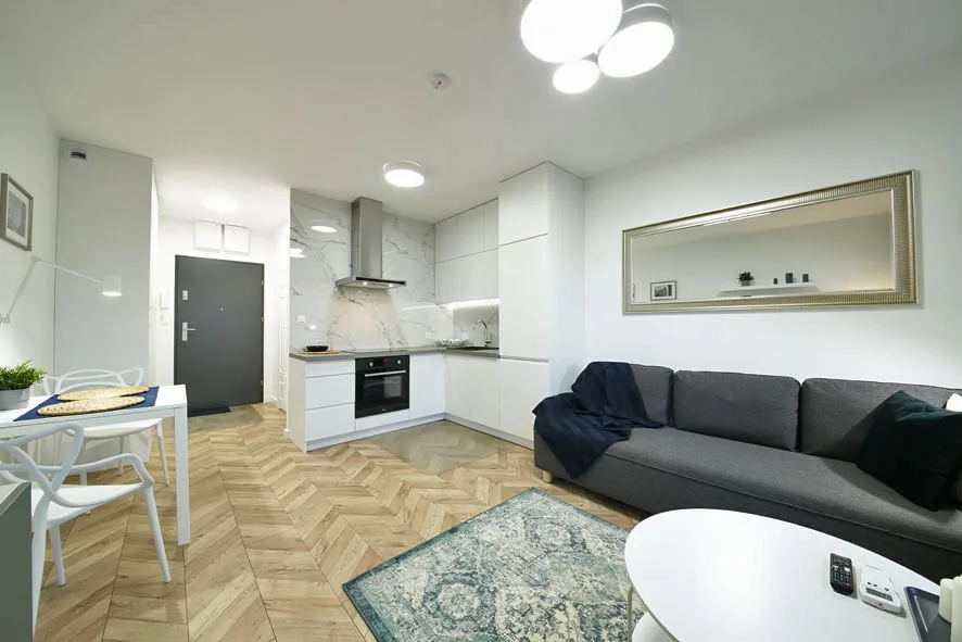 Salon z aneksem kuchennym w apartamencie Wrocław Legnicka 59